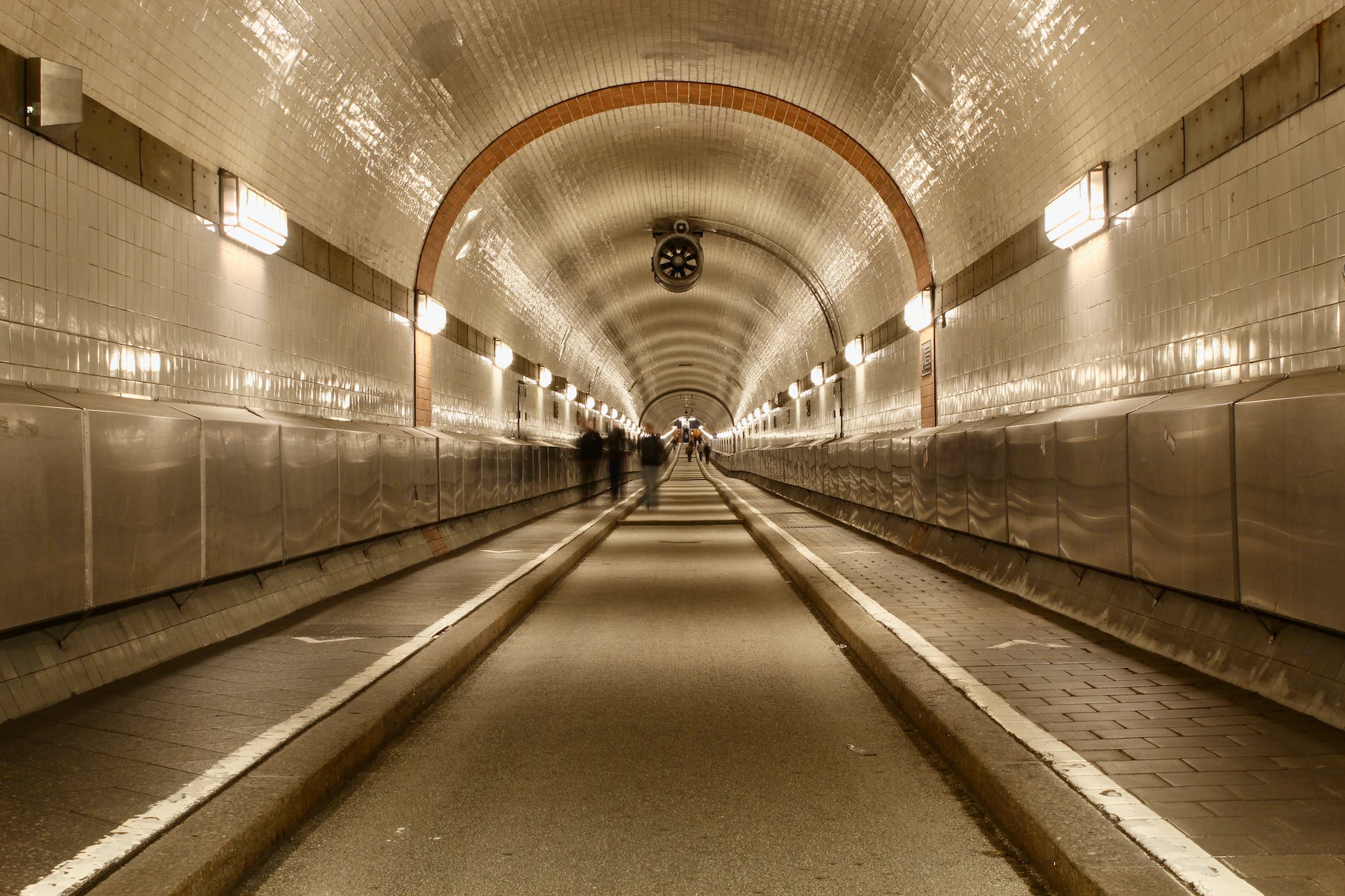 people walking in the alter elbtunnel