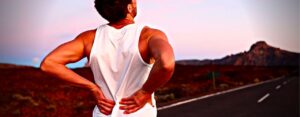 Douleur au bas du dos lors de la course à pied ? 5 causes courantes + comment y remédier