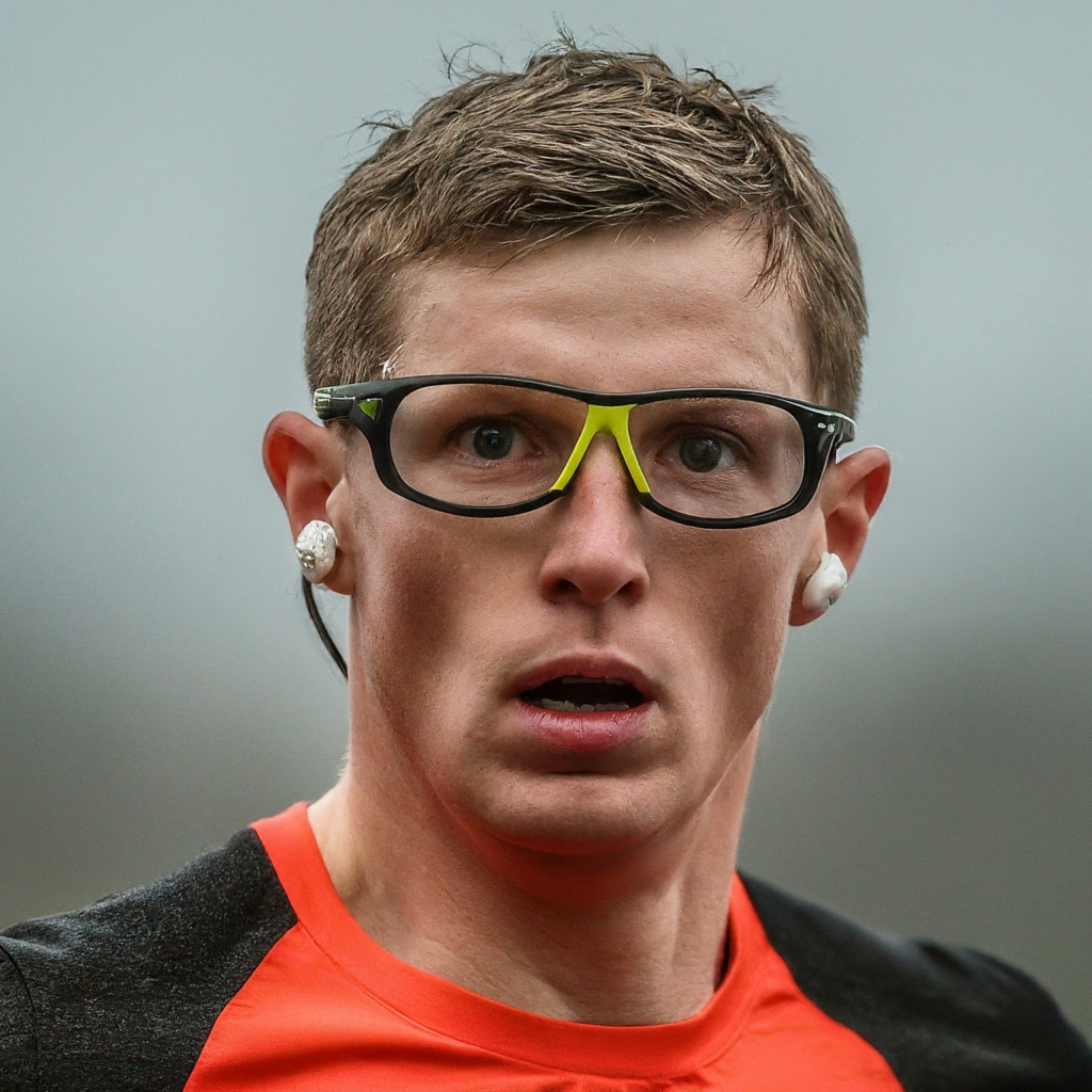 Visage d'un coureur avec des lunettes de vue